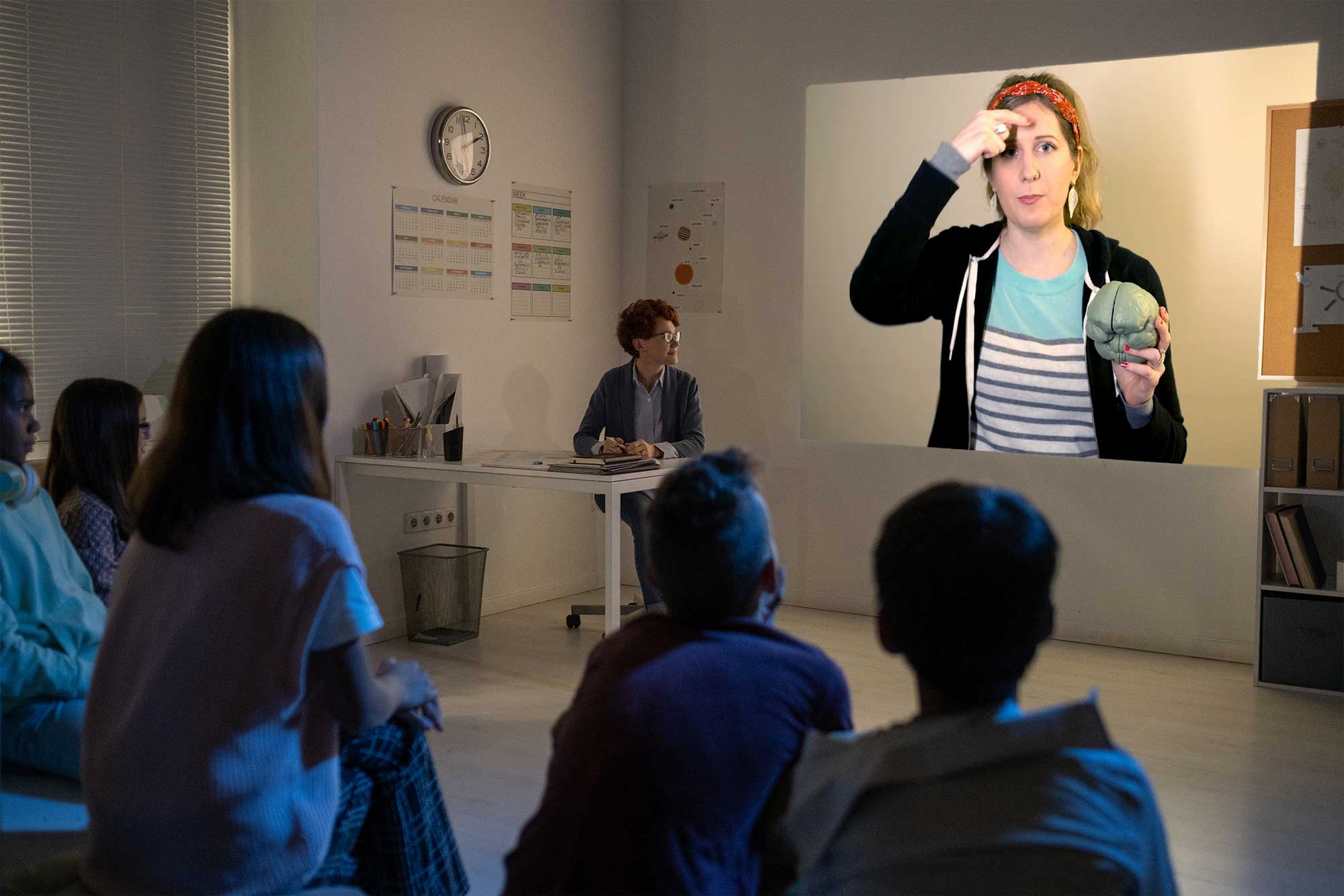 classroom-with-projector-on-wall Classroom watching Julie's Brain Talk segment